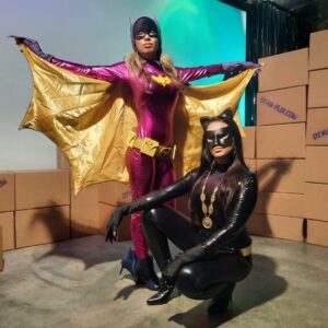 Batgirl and Catwoman, stars of dyna-flix.com's new tribute to the Siamese Human Knot!